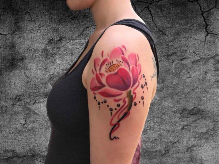 Pink Lotus Tattoo Blooming Beauty: The Profound Symbolism of the Pink Lotus Tattoo in a Transformative Journey